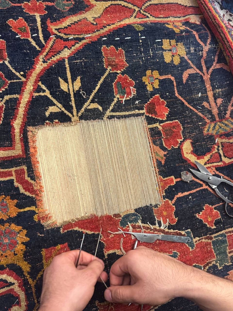 Restoration of antique Bijar carpet